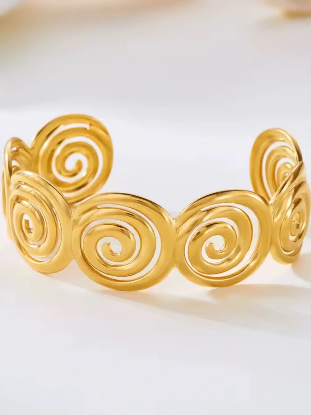 Golden Spiral Cuff Bracelet – Modern Sculptural Statement Jewelry